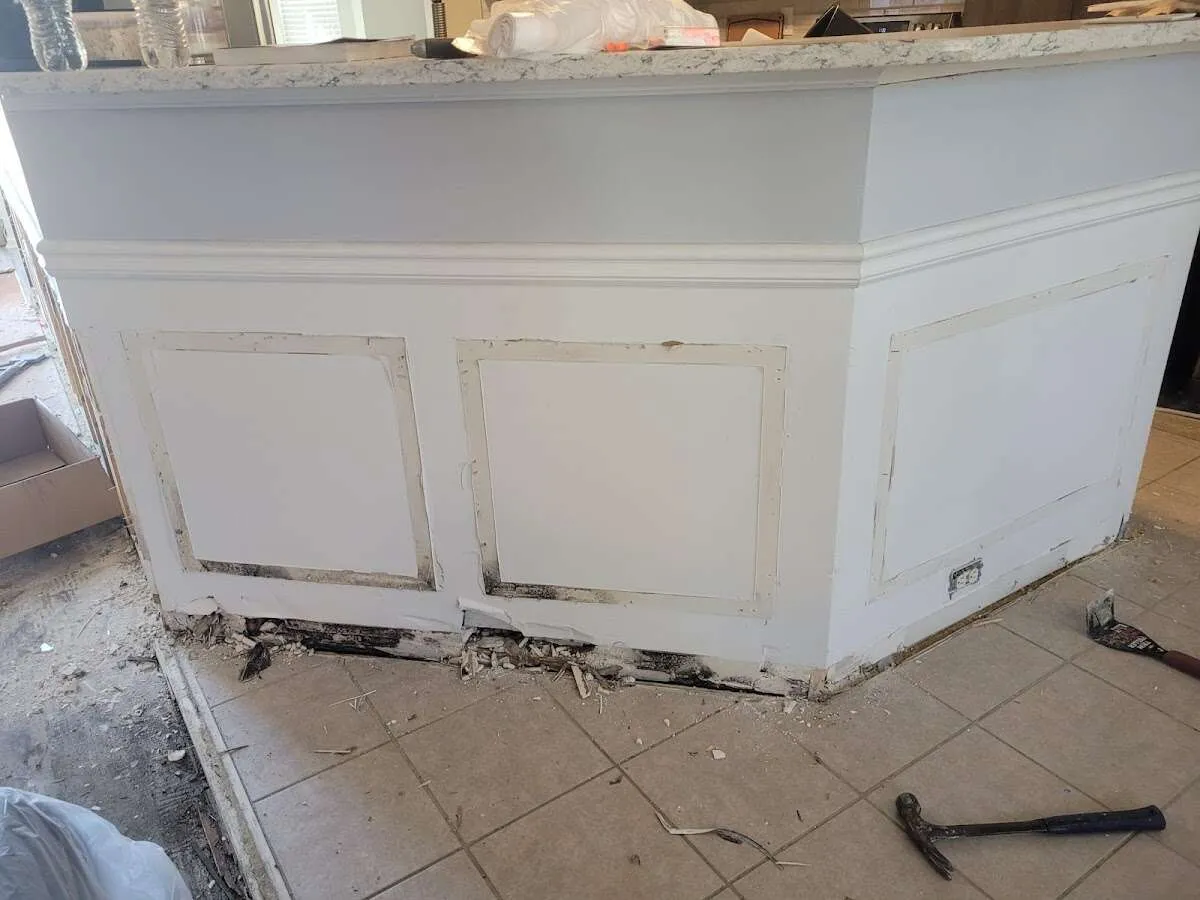 Water damage and mold on kitchen during Storm Damage Restoration in Washington